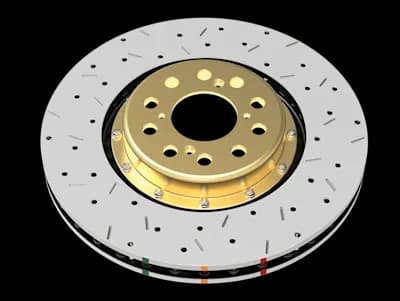 Disque de frein DBA 5000 Series XS avec trous percés et fentes sur surface argentée, moyeu central doré et marquages indicateurs colorés